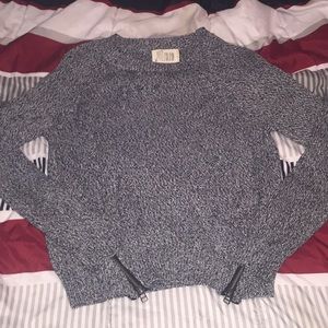 Holiday sweater with holes/zippers